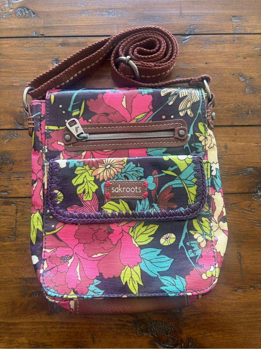 Sakroots Floral Crossbody Bag in vibrant colors